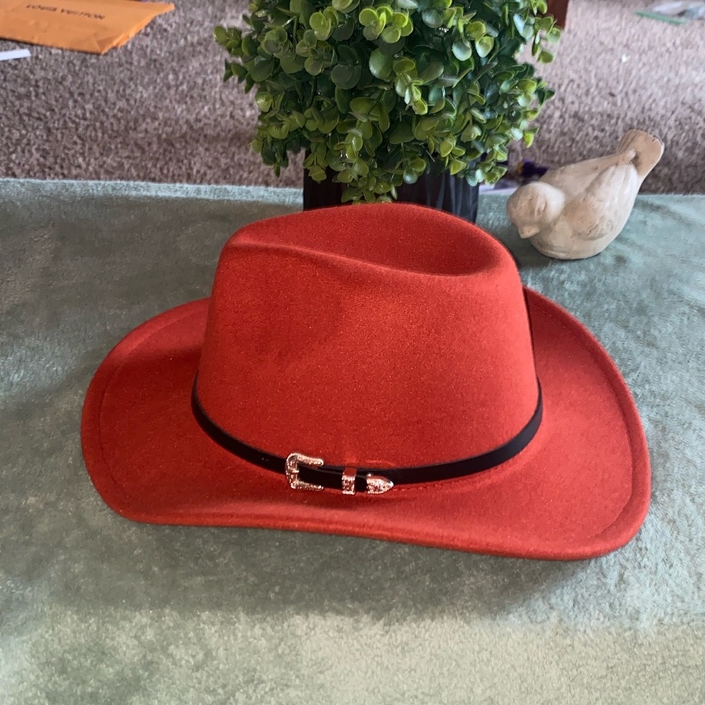 Beautiful rust colored and black hat!